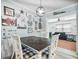 Charming dining area with decorative wall art, farmhouse style table and views into the living area at 1310 Parker Rd, Lakeland, FL 33811