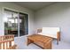Covered outdoor patio area with comfortable seating and a view of the backyard at 1794 Daystar Dr, Haines City, FL 33844