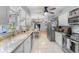 Modern kitchen with stainless steel appliances and great sight lines into living spaces at 2020 Indian Trl, Lakeland, FL 33813
