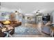 Open concept living room flows into dining area with lots of natural light and decorative features at 2020 Indian Trl, Lakeland, FL 33813