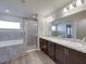 This bathroom features a soaking tub, separate shower, and double sink vanity at 236 Talladega Ln, Polk City, FL 33868