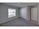 Comfortable bedroom featuring carpet and closet at 236 Talladega Ln, Polk City, FL 33868