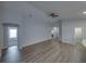 Spacious living room with modern flooring, neutral walls, and ample natural light at 236 Talladega Ln, Polk City, FL 33868
