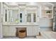 Traditional bathroom featuring double vanity with a makeup area and a soaking tub at 2900 Grasslands Dr, Lakeland, FL 33803
