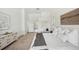 Bright and airy main bedroom features large windows and an ensuite bathroom at 2900 Grasslands Dr, Lakeland, FL 33803