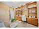 Well-lit office featuring built-in shelving and an adjacent room through the doorway at 2900 Grasslands Dr, Lakeland, FL 33803
