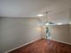 Spacious living room with hardwood floors and a ceiling fan at 320 Eron Way # 6, Winter Garden, FL 34787