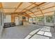 Large covered patio with outdoor kitchen and lounge area at 3995 Townley Dr, Mulberry, FL 33860