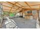 Spacious covered patio with an outdoor kitchen and lounge area at 3995 Townley Dr, Mulberry, FL 33860