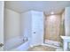 Well-appointed bathroom includes a soaking tub and separate glass-enclosed shower at 4062 Tullamore Ln, Auburndale, FL 33823
