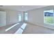 Spacious bedroom features a door to the backyard, plus bright, natural light at 4062 Tullamore Ln, Auburndale, FL 33823