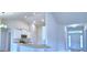 Bright kitchen with granite countertops, stainless appliances, and breakfast bar in a spacious open-concept home at 4062 Tullamore Ln, Auburndale, FL 33823