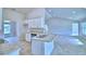 Modern kitchen island with sink and granite countertop at 4062 Tullamore Ln, Auburndale, FL 33823
