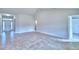 Open-concept living area with tile flooring, recessed lighting, and a clear view of the front entrance at 4062 Tullamore Ln, Auburndale, FL 33823