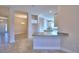 Modern eat-in kitchen boasts sleek countertops, ample cabinet space, and open access to the dining and living areas at 4123 Tullamore Ln, Auburndale, FL 33823