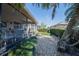 Landscaped backyard area with a screened patio, perfect for outdoor living at 4315 Larrys Lagoon, Winter Haven, FL 33884