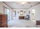 Open layout of a large bedroom with ensuite access, and lanai doors at 4315 Larrys Lagoon, Winter Haven, FL 33884