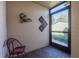 Charming entryway with brick floors and decorative wall art at 4315 Larrys Lagoon, Winter Haven, FL 33884