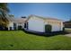 Charming single-story home with well-manicured lawn and attached two-car garage at 4315 Larrys Lagoon, Winter Haven, FL 33884