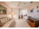 Comfortable living room with a decorative ceiling fan and deer-themed wallpaper border at 4315 Larrys Lagoon, Winter Haven, FL 33884