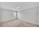 Bedroom features plush carpeting, neutral walls, and a window providing natural light at 4424 Reding Way, Lakeland, FL 33813