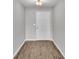 Inviting entryway with neutral walls and sleek wood-look floors at 4424 Reding Way, Lakeland, FL 33813