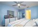 The main bedroom includes a dresser with mirror, and offers access to the ensuite bathroom at 4427 Whistlewood Cir, Lakeland, FL 33811