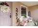 Inviting front porch with a decorative wreath and cozy seating area at 4427 Whistlewood Cir, Lakeland, FL 33811