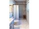 Modern bathroom featuring a shower, toilet, and stylish vanity with marble countertops at 4641 Devon Ave, Lakeland, FL 33813