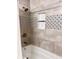 Close-up of a luxurious shower with stylish tile work and updated fixtures at 4641 Devon Ave, Lakeland, FL 33813