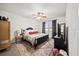 Comfortable bedroom showcasing a decorative rug and plenty of natural light at 474 Cedar Glen Dr, Lake Alfred, FL 33850