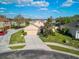 Charming single-story home featuring a well-manicured lawn and attached two car garage at 474 Cedar Glen Dr, Lake Alfred, FL 33850