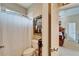 Bathroom with a toilet, and Asian-themed decor, with a view to the bedroom at 565 Osprey Landing Dr, Lakeland, FL 33813