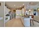 Open kitchen design with a breakfast bar, stainless steel appliances, and a view into the breakfast nook at 565 Osprey Landing Dr, Lakeland, FL 33813