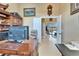 Spacious home office with a view, a desk and comfortable seating for work at 565 Osprey Landing Dr, Lakeland, FL 33813