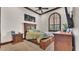 Bedroom with a ceiling fan and an arched window for natural light at 5676 Case Ln, Lakeland, FL 33813
