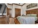 Bedroom featuring wooden trim and custom wooden furniture at 5676 Case Ln, Lakeland, FL 33813