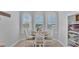 Charming breakfast nook with bright windows, a round table, and four chairs at 5676 Case Ln, Lakeland, FL 33813