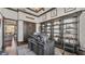 The study features custom wood built-ins, wood floors and trim at 5676 Case Ln, Lakeland, FL 33813