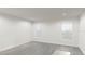 Bright bedroom with wood-look floors, and two windows for ample natural light at 5750 Anders Way, St Cloud, FL 34771
