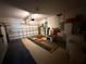 Spacious garage with ample storage, a garage door opener, and built-in shelving at 6059 Swallow Dr, Lakeland, FL 33809