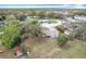 Aerial view of the home showing backyard, landscaping and neighborhood at 6305 Tocobega Dr, Lakeland, FL 33813