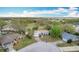 Birds eye view of a quaint home surrounded by lush greenery and neighborhood charm at 6305 Tocobega Dr, Lakeland, FL 33813