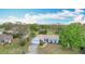 An aerial view of a blue single Gathering home with a large yard at 6305 Tocobega Dr, Lakeland, FL 33813