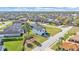 Beautiful aerial view of a well-maintained home in a desirable community, featuring lush landscaping at 6421 Highlands Oak Trl, Lakeland, FL 33813