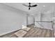 Bright upstairs landing with wood-look floors, crown molding, with open view to other rooms at 6421 Highlands Oak Trl, Lakeland, FL 33813