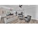 Open concept living space featuring a neutral color palette and seamless flow between living and dining areas at 6421 Highlands Oak Trl, Lakeland, FL 33813