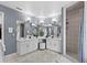Bathroom with double sinks and a walk in shower at 6810 Crystal Beach Rd, Winter Haven, FL 33880
