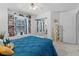 Bedroom with a cozy window nook and custom built-in shelving for storage at 6810 Crystal Beach Rd, Winter Haven, FL 33880