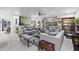 Spacious living room with contemporary furniture, a large picturesque window and stylish decor at 6810 Crystal Beach Rd, Winter Haven, FL 33880